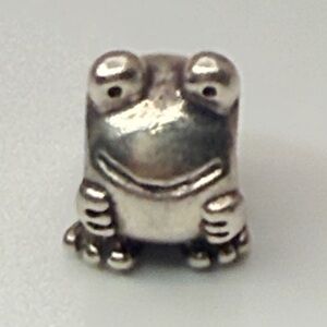 Retired Pandora “Happy Frog” sterling silver charm, model 790247.